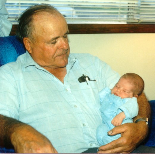 Grandpa Holds The Baby